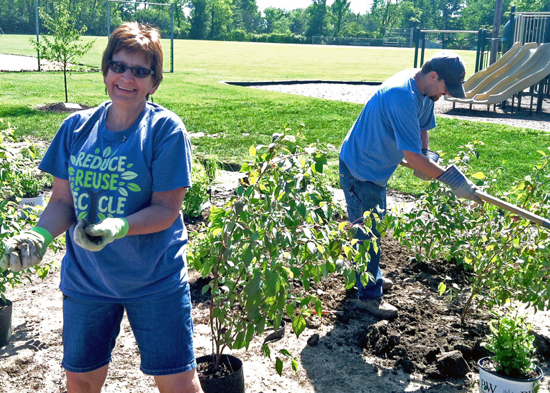 Melody-Newman-and-Jake-Hahn-plant-a-rain-garden-at-Veterans-Park-in-Union-Township-in-Spring-2015