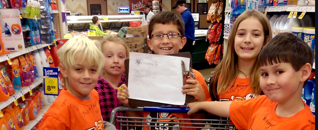Loveland students blend learning with giving for a holiday treat for more than 80 families in need