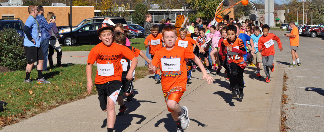 Loveland Elementary School Runner’s Club crosses the finish line for fall