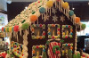 Win this charming gingerbread house from Loveland Sweets
