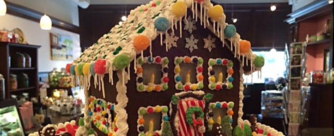 Win this charming gingerbread house from Loveland Sweets