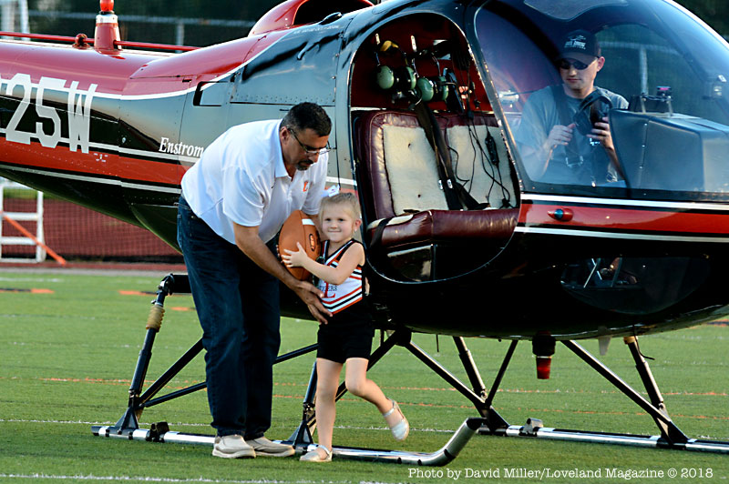 Sam David and Charli-Jo deliver Homecoming game ball from the sky