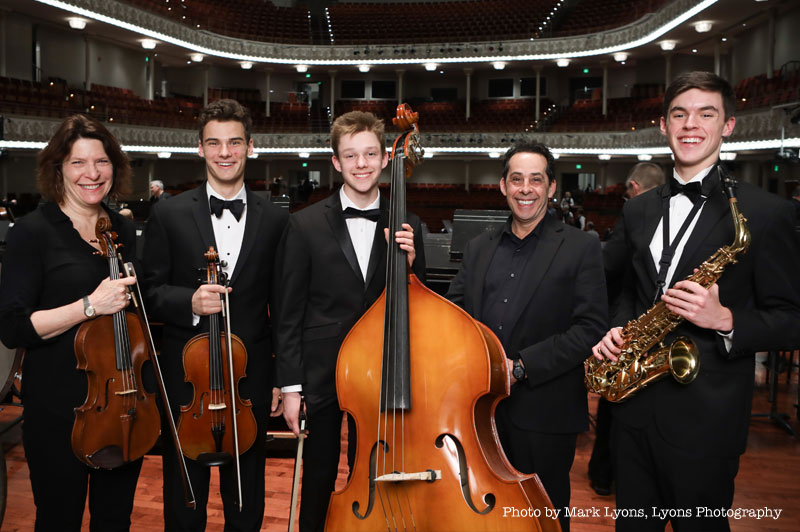 Evan Dial, Jacob Kiley, and Luke Faessler perform with Cincinnati Symphony Orchestra