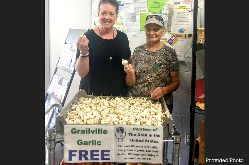 Mary Lu Lageman donates famous garlic to food pantry