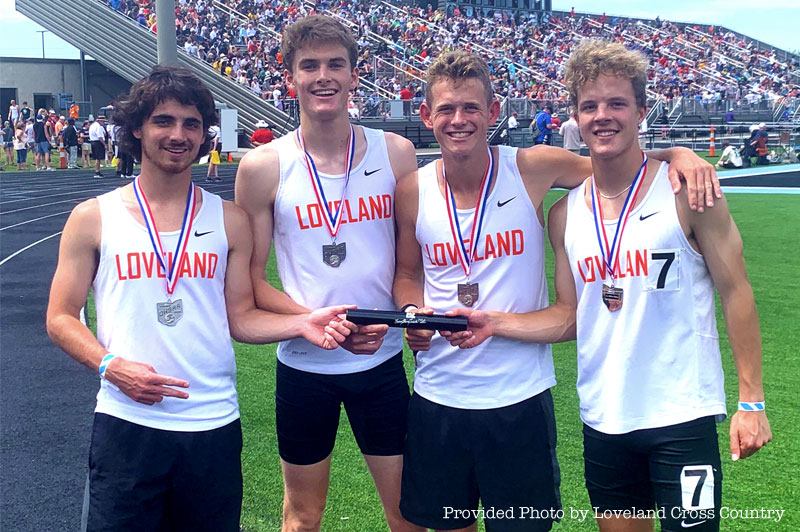 Loveland High School Track Stars flashing medals from State Tournament