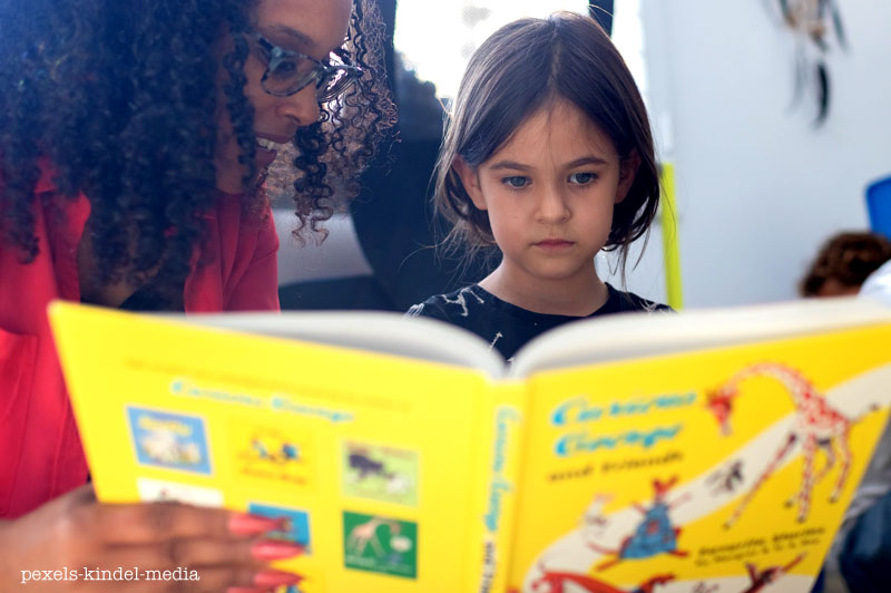 Compassionate students help feed other children through reading at the Loveland Elementary School