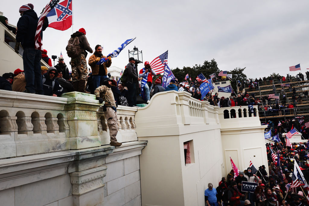 Hitting cops, roaming the Senate, smoking pot: DOJ says Ohioans were everywhere Jan. 6