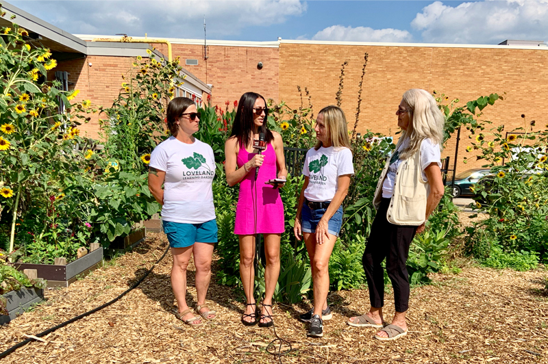 Table of Discussions Tours the Loveland Learning Garden