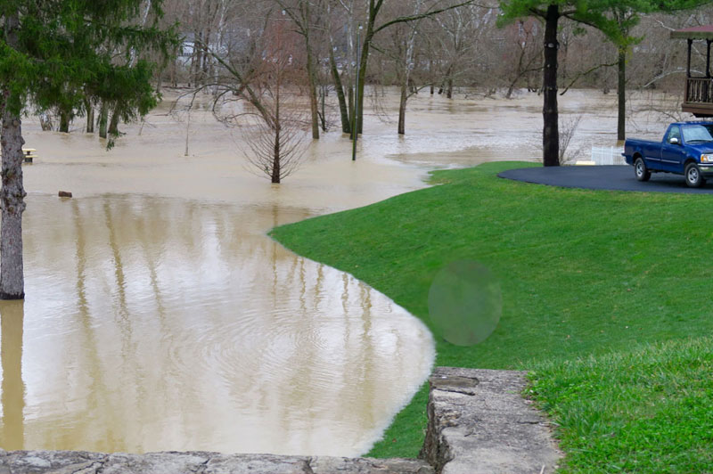Loveland Magazine file photos of past flooding at the location where12 single family homes are proposed